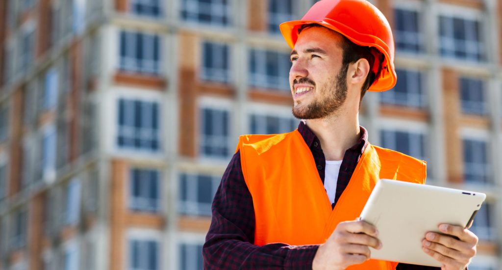 medium-shot-portrait-construction-engineer-holding-tablet